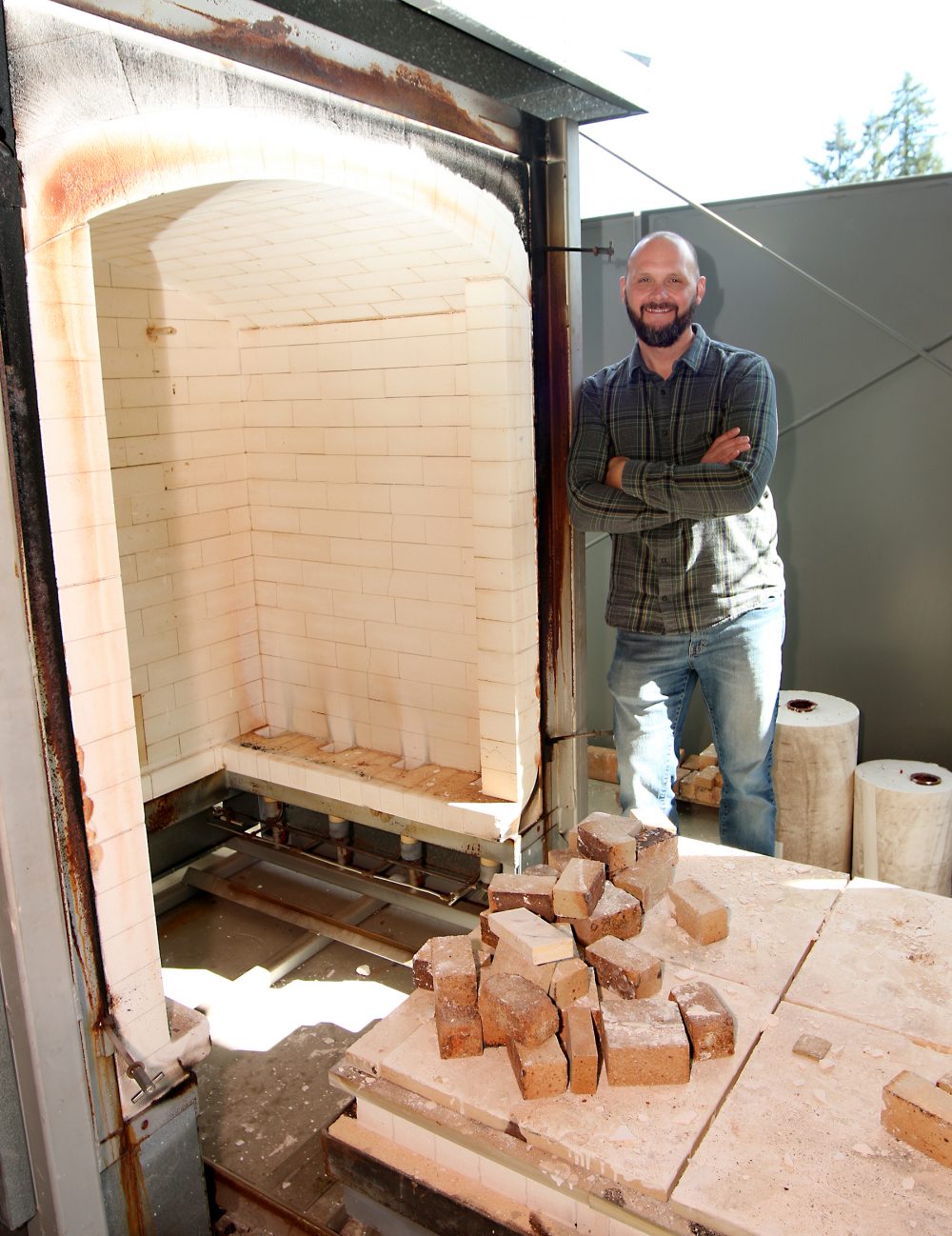 Ben Buswell teaches metal casting inside the new foundry at the Rock Creek Campus.