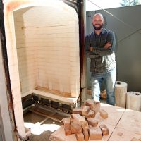 Ben Buswell teaches metal casting inside the new foundry at the Rock Creek Campus.