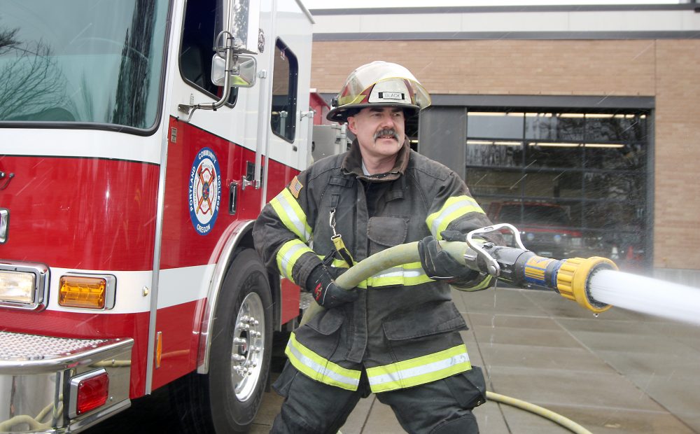 Black handles water hose.