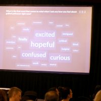 Key words on screen on stage.