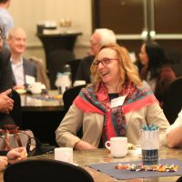 Mitsui chats with staff.