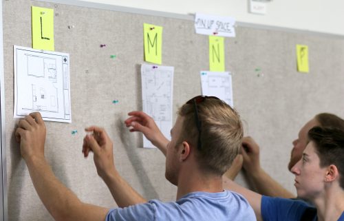 Campbell instructs her students on their pinups of bubble diagrams for their first space planning exercise.