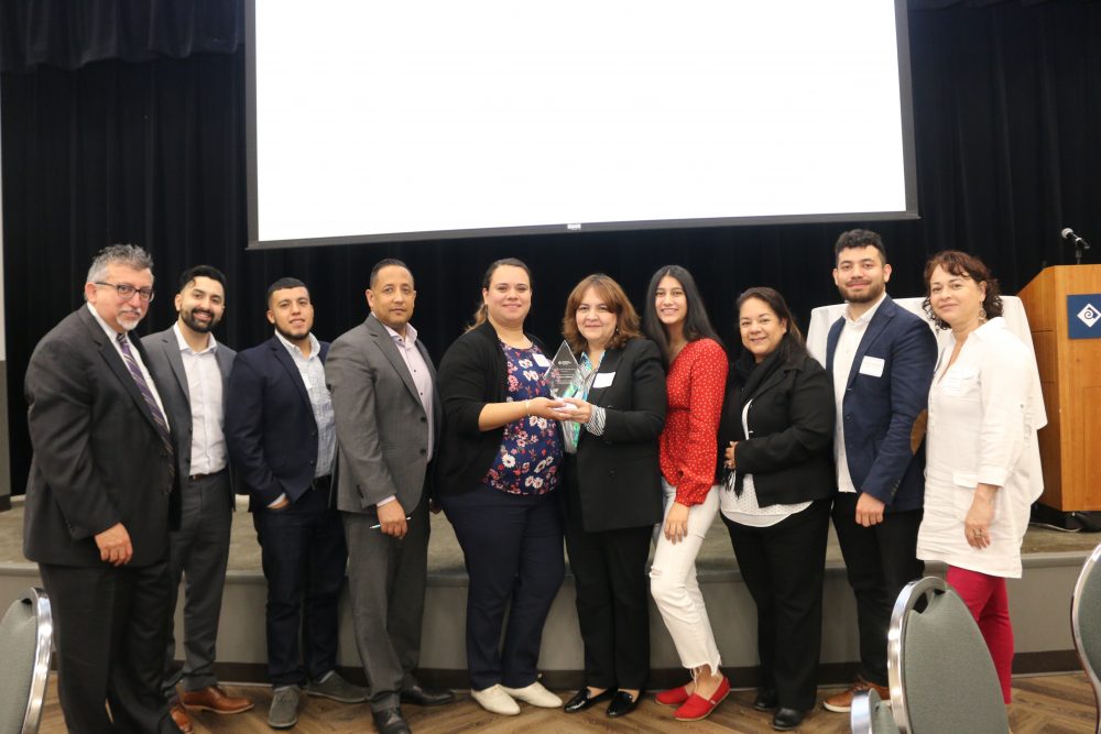 Centro Cultural with award.