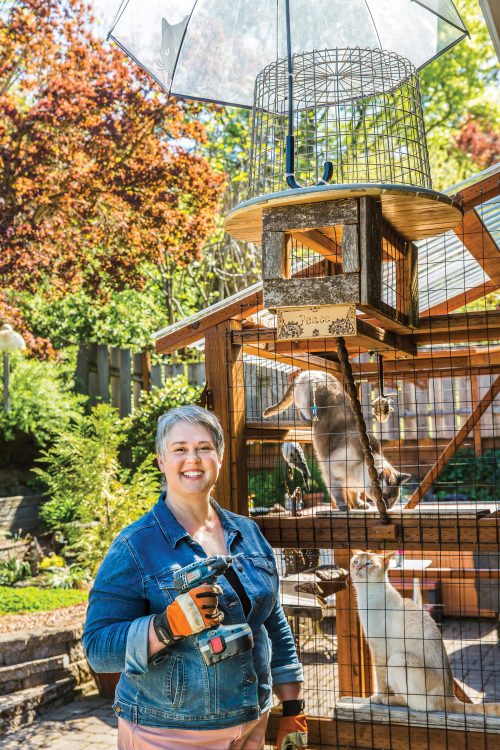 Gordon-Nelson in front of catio.