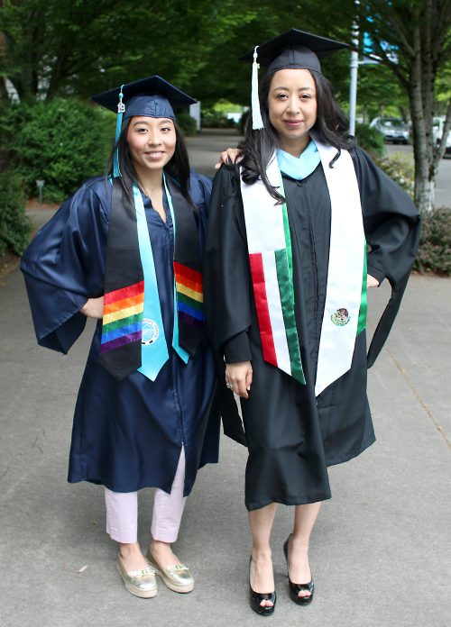 Veyda and Margarita in cap and gowns.