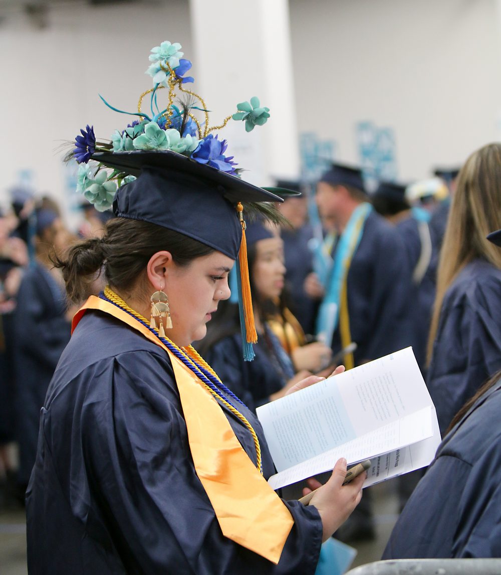 Student with a weird, ornate hat.