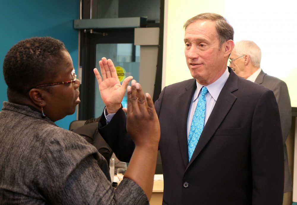 Dan Saltzman sworn in by Justice Nelson.