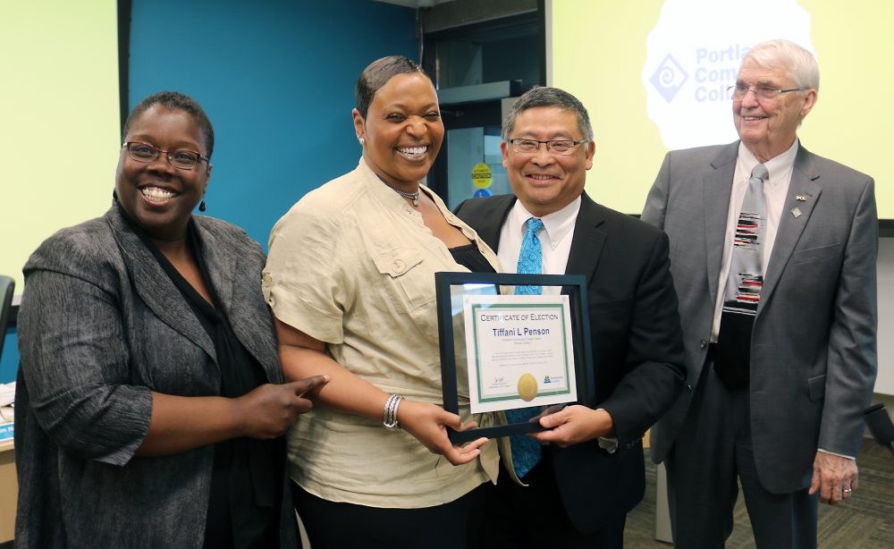 Tiffani Penson holds her election certificate.