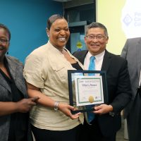 Tiffani Penson holds her election certificate.