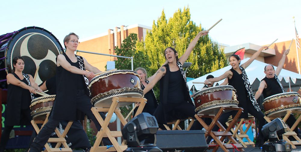 Taiko drummers on stage