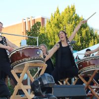 Taiko drummers on stage