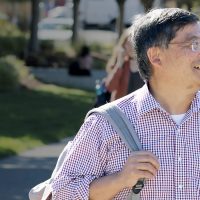 Mark Mitsui with backpack at Southeast Campus