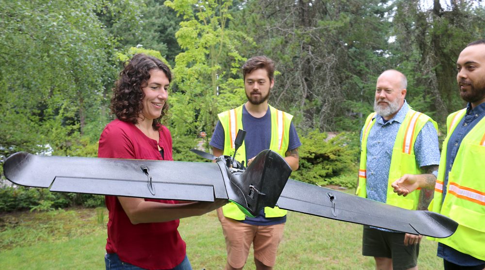 Christina Friedle with her students and the drones.