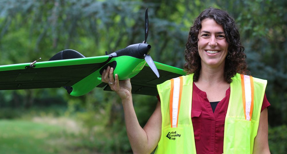 Christina Friedle with fixed wing drone.
