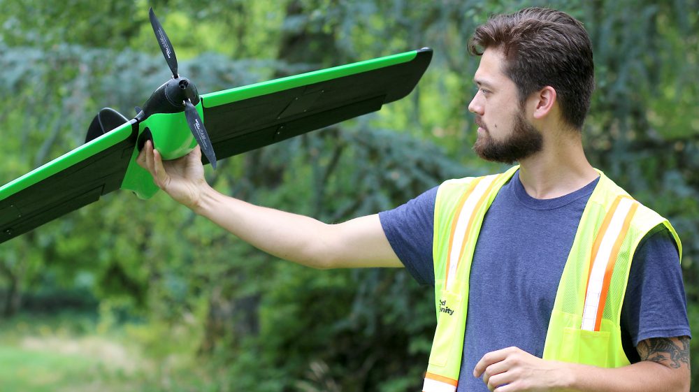 Devin Shiang with fixed-wing drone.