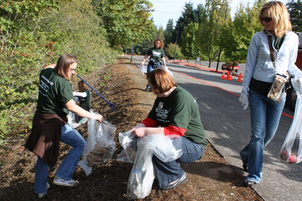 Picking up cigarette butts.