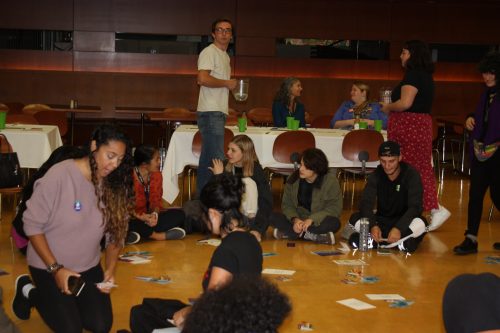 Picture of students, staff and faculty at the Hunger Banquet