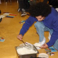 Picture of student serving themselves rice