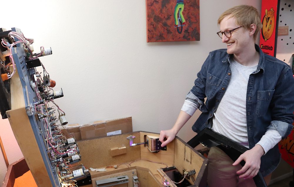 Luke repairs a machine