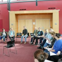 Ian Symmonds leads a listening session at Sylvania Campus.