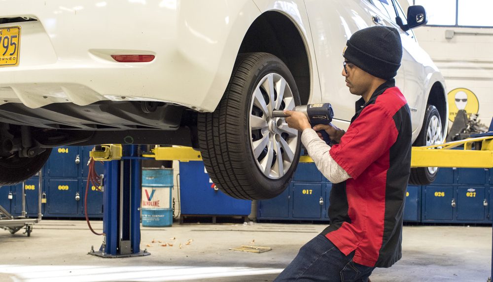 Luna working on tire.