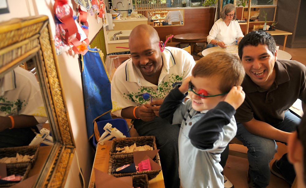 Early Child Development staff with kids.