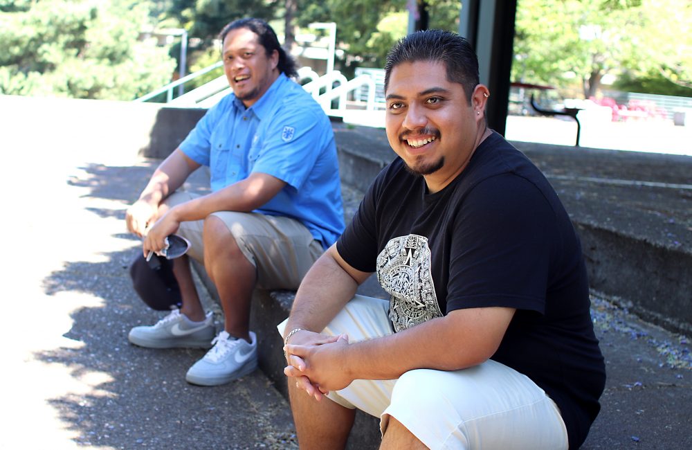 Jorge Cruz sitting on steps.