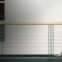 President Mark Mitsui walking in a building on campus