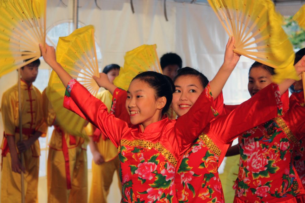 Young Chinese martial arts and dance performers from the Portland Art & Cultural Center entertain the large crowd at PCC’s Southeast Campus groundbreaking in 2012.