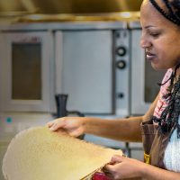 Eleni Woldeyes teaching and Ethiopian cooking class