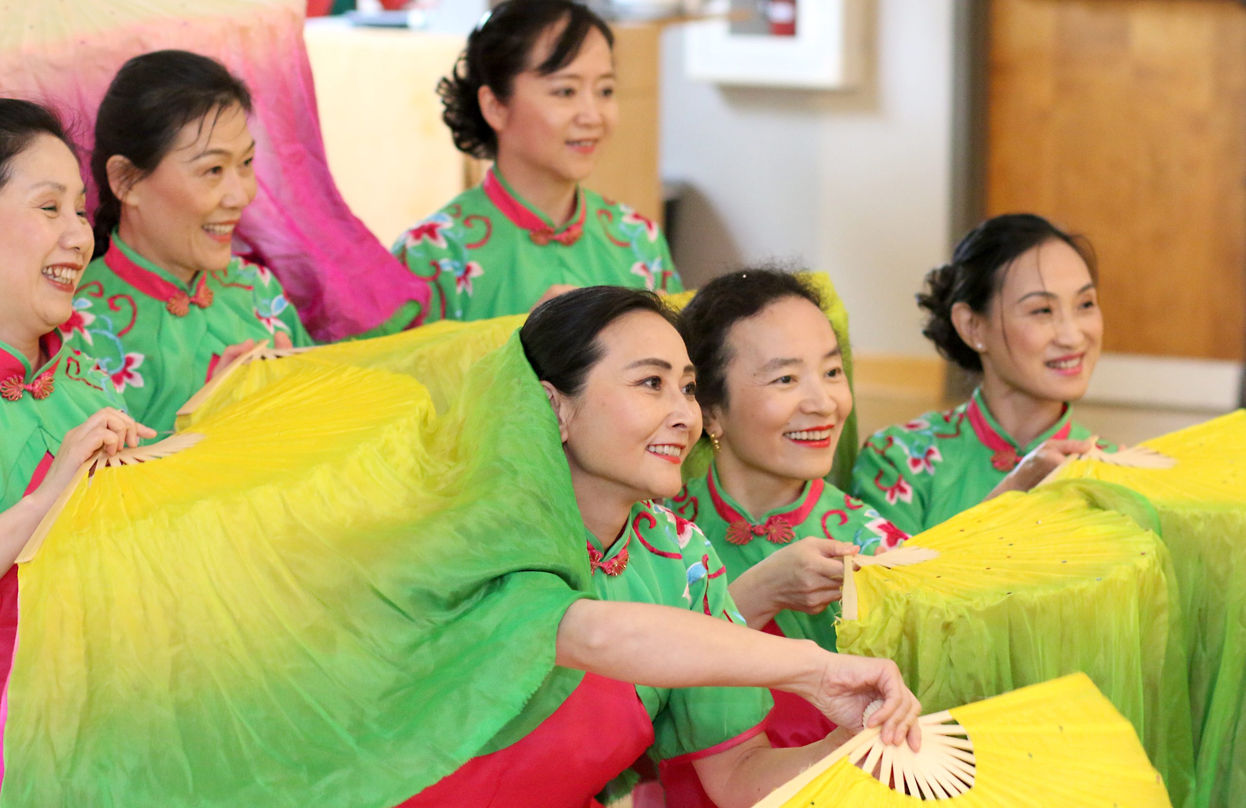 Chinese dancers pose for pictures at International Week.