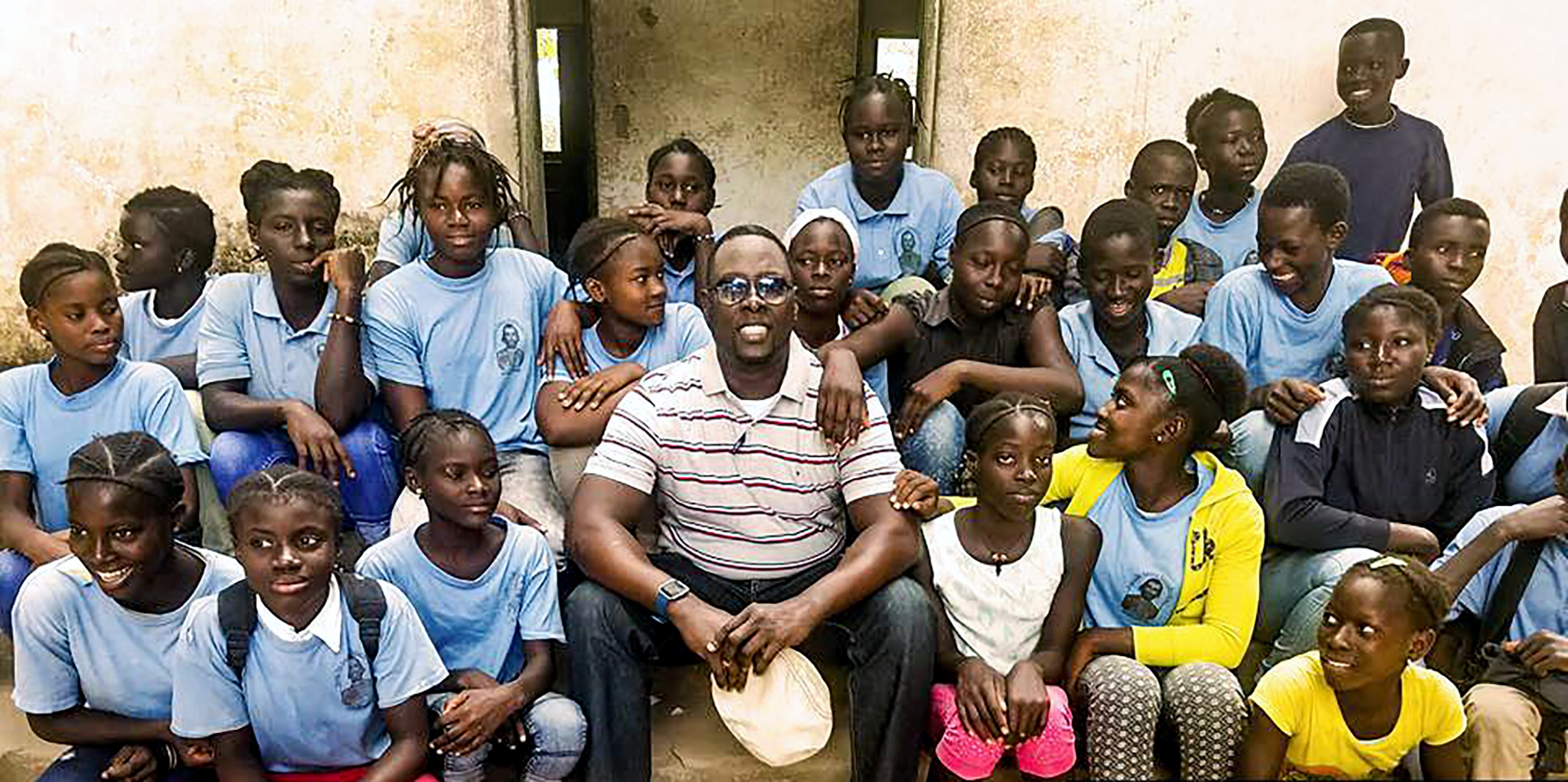 Silva in West Africa with kids.