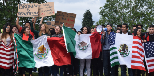 Students rally outside of the Forest Grove School District offices after their walkout at Forest Grove High School.