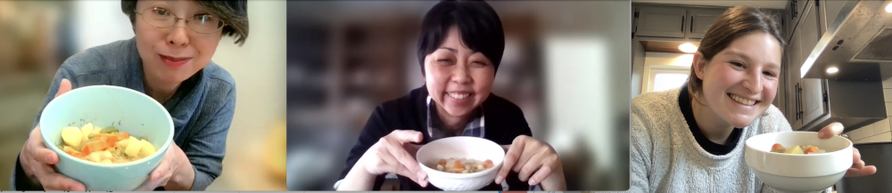 students holding up the meal they created together