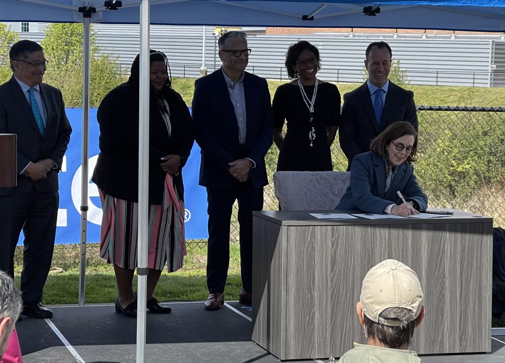 Gov. Kate Brown signs the Future Ready Oregon law