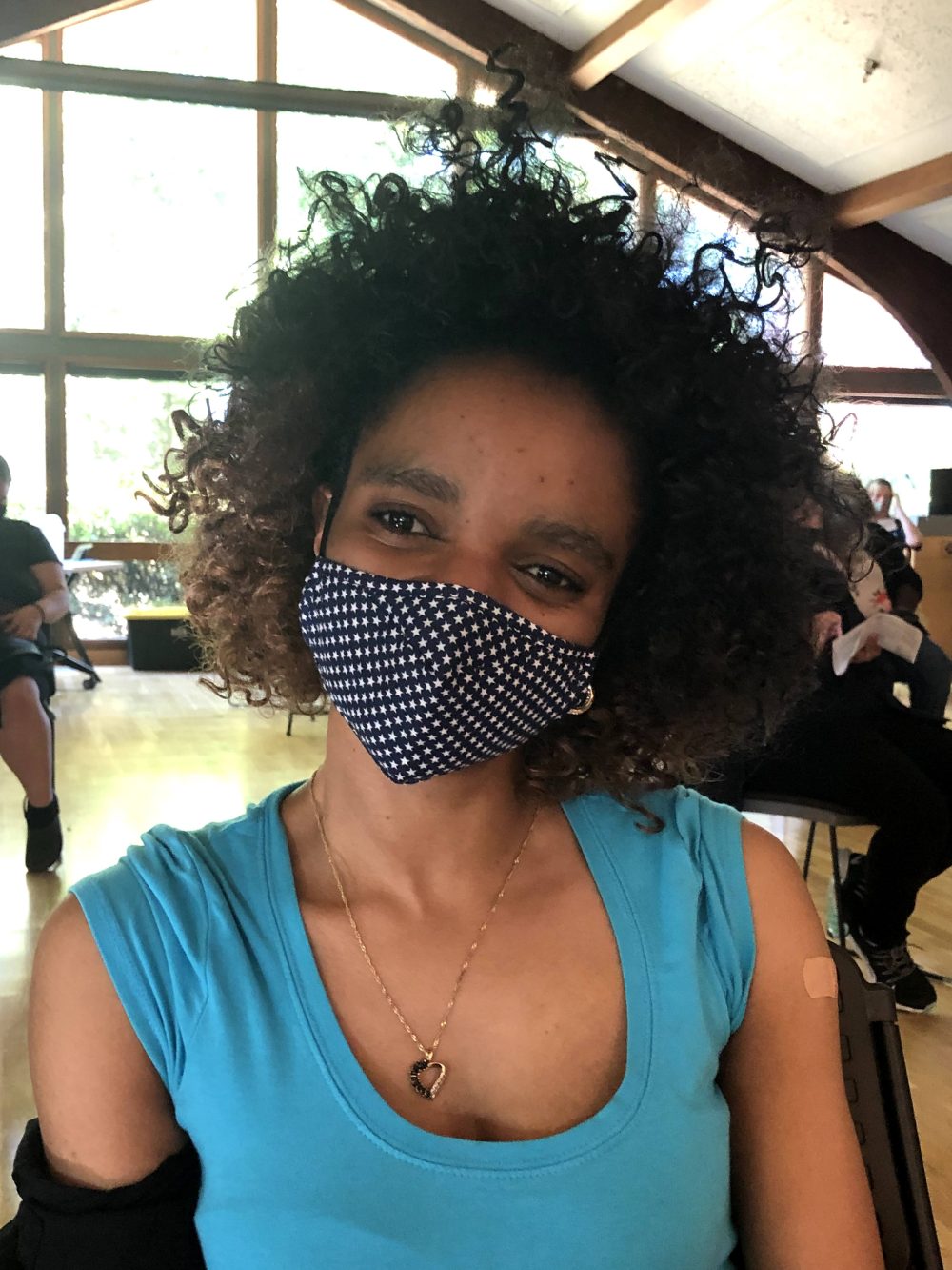 ESOL student in the waiting area after the vaccine