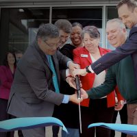 Cutting the ribbon at a ceremony