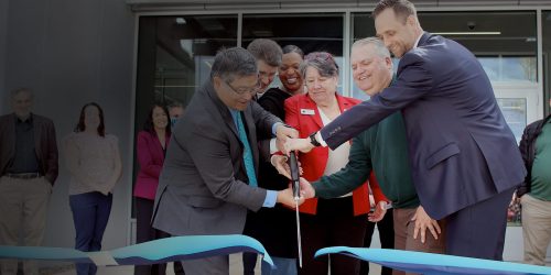 Cutting the ribbon at a ceremony