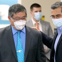 PCC President Mark Mitsui and Secrtary Becerra share a light moment in PCC"s new medical imaging lab.