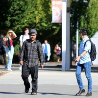 people walking on campus