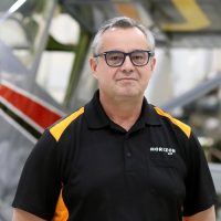 Archie Vega in hangar