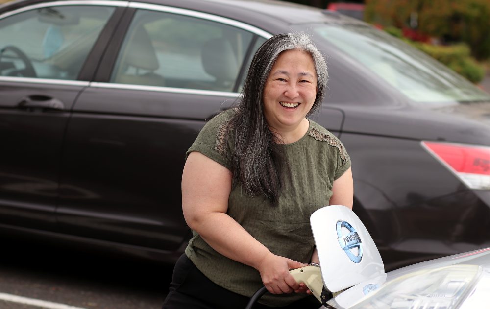 Steph Fregosi charging car.