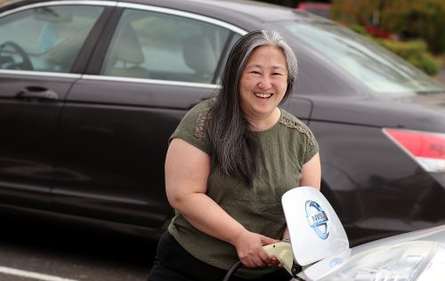 Steph Fregosi charging car.