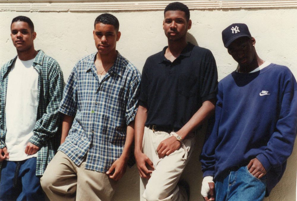 Marvin Sadler (center, right) and Leon to his left