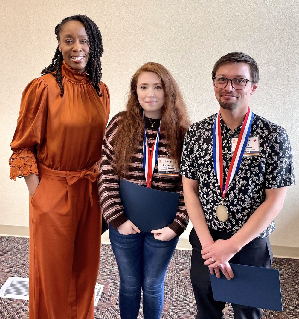 Dr. B with Emily Swenson and Joshua Webb.