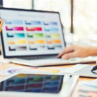 Graphic designer Brainstorming drawing on graphics tablet at workplace