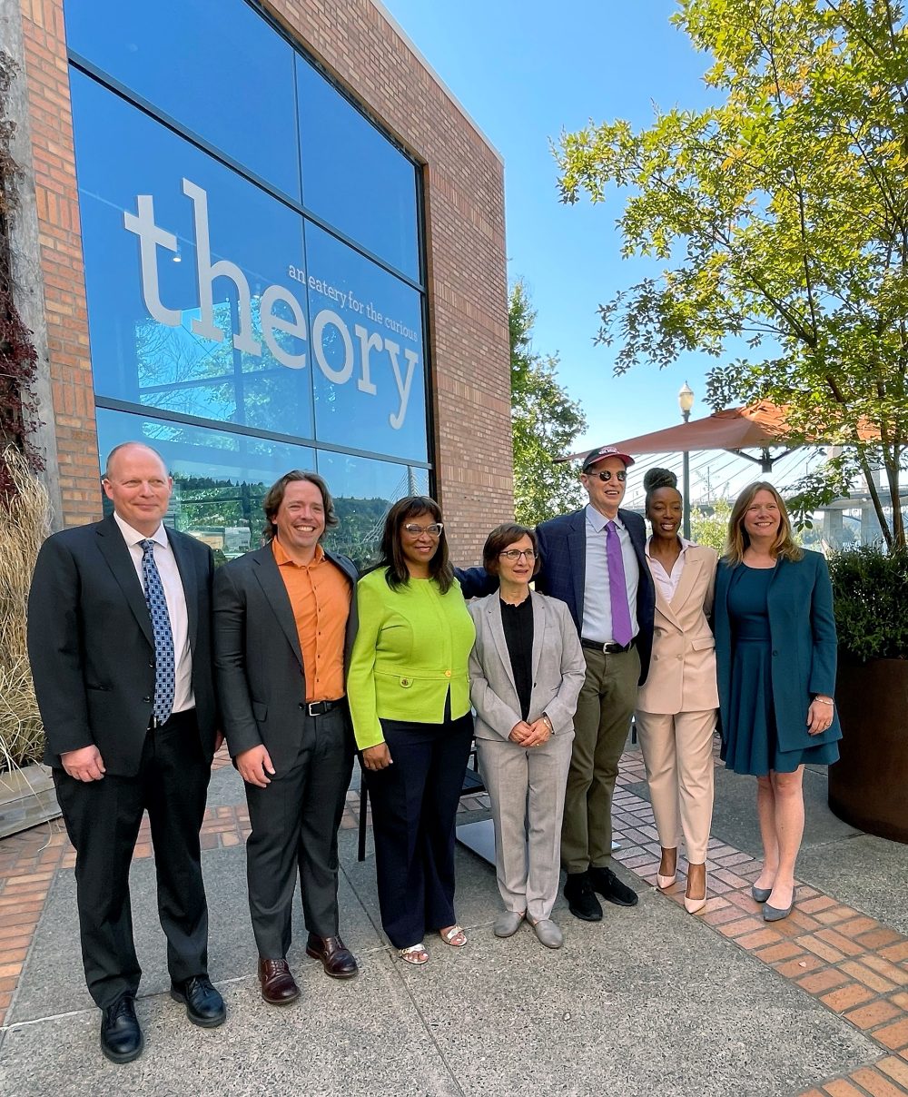 From left, Fred Bailey of Analog Devices, Scott Clark of SigOpt, State Rep. Janelle Bynum, Congresswoman Suzanne Bonamici, U.S. Senator Ron Wyden, PCC President Adrien Bennings and OMSI President Erin Graham.