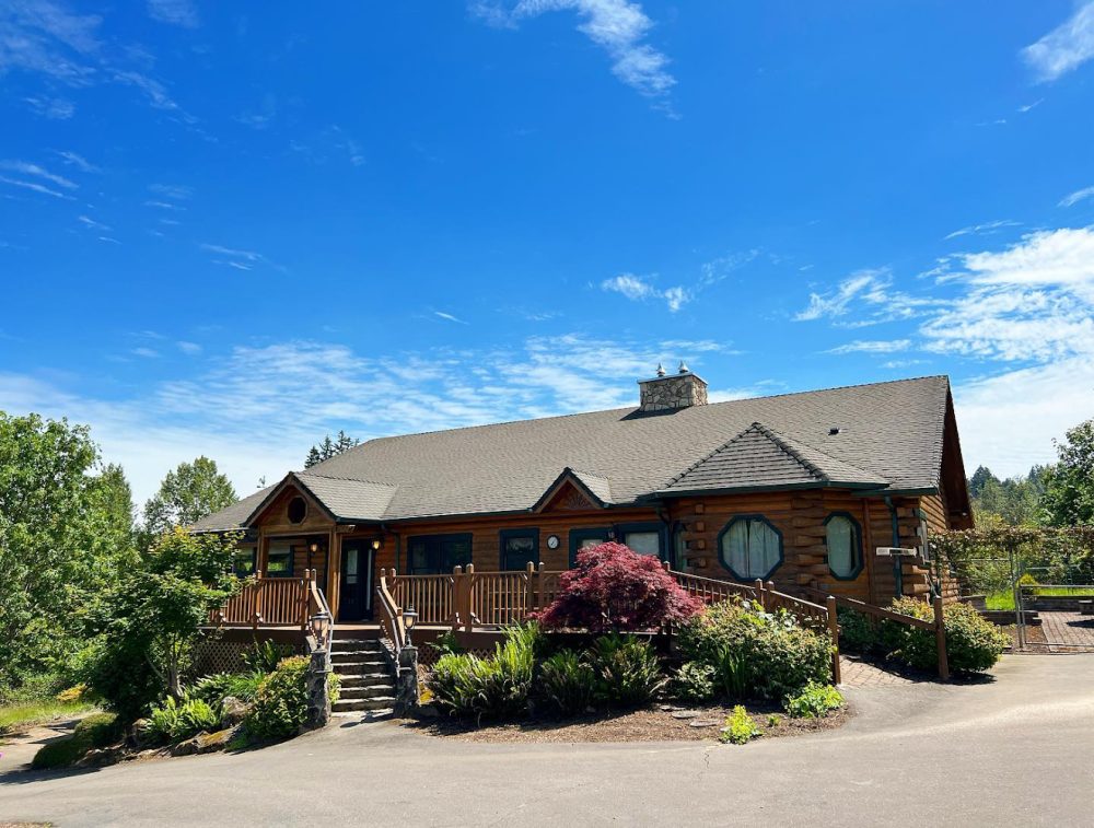 Exterior image of lodge style Carolyn Moore Writers House in Tigard, Ore.