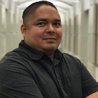 Joe Hernandez close-up of young Latinx poet.