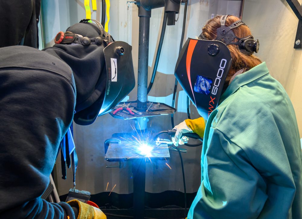 Welding in one of the booths.